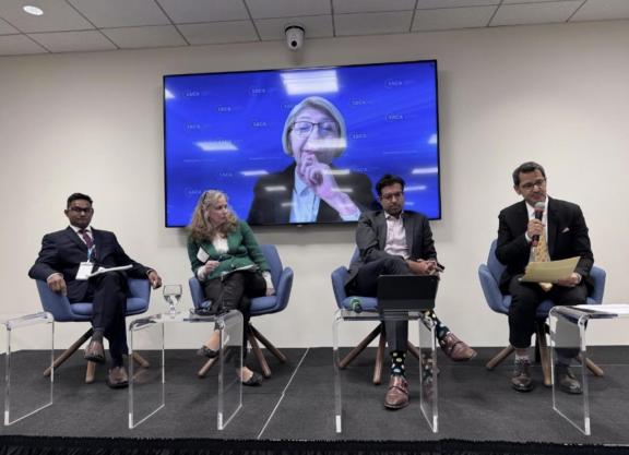 Integrity & Compliance Manager Sanjeev Narrainen participants on a panel about the link between climate change and corruption